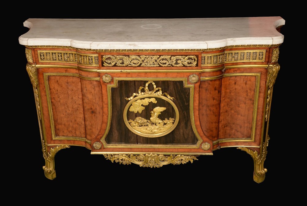A fine Louis XVI design ormolu mounted thuya wood commode à vantaux