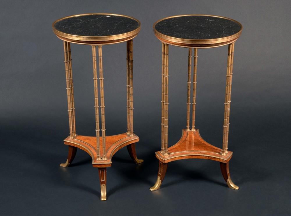 A pair of Louis XVI design ormolu and burr walnut gueridons