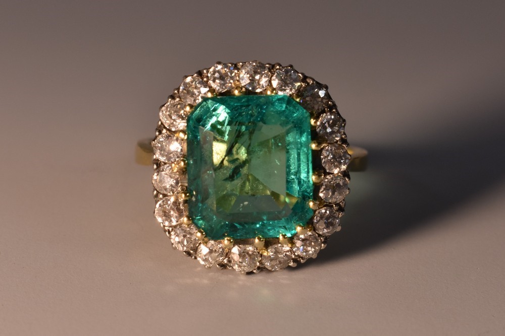 A Columbian emerald and diamond cluster ring