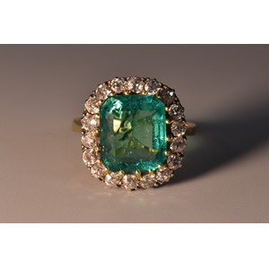 A Columbian emerald and diamond cluster ring