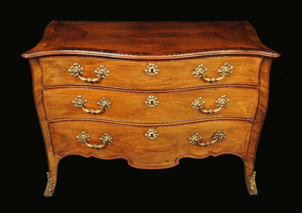 A fine Chippendale period Rococo gilt metal mounted mahogany serpentine commode