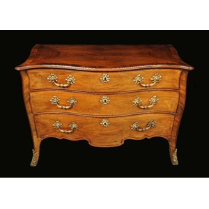 A fine Chippendale period Rococo gilt metal mounted mahogany serpentine commode