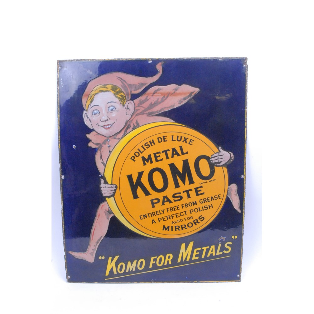 A rectangular pictorial enamel sign, KOMO Metal Paste