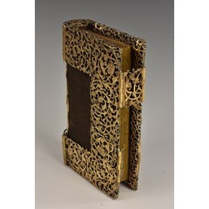 An 18th century Rococo silver-gilt book cover