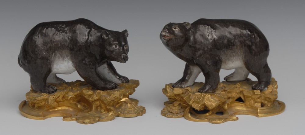 A pair of ormolu mounted porcelain models of bears