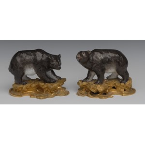A pair of ormolu mounted porcelain models of bears