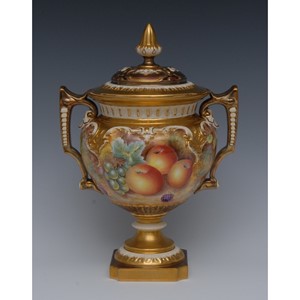 A Royal Worcester pedestal lobed ovoid two handled vase and cover