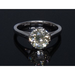 A platinum and diamond solitaire ring
