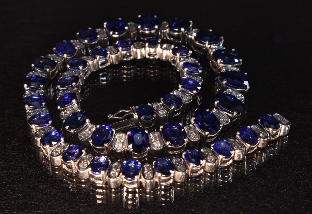 A graduating sapphire and diamond necklace
