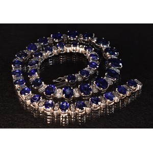 A graduating sapphire and diamond necklace