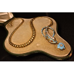 A Victorian split pearl and enamel serpent necklace
