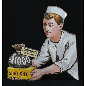 Advertising, Lever Brothers, Sunlight Soap – a late 19th/early 20th century ‘Baker Boy’ (facing left) die-cut pictorial enamel sign, produced to be mounted on either side of a cart or trolley bus, “£1000 Guarantee of Purity Sunlight”, 86cm x 82cm