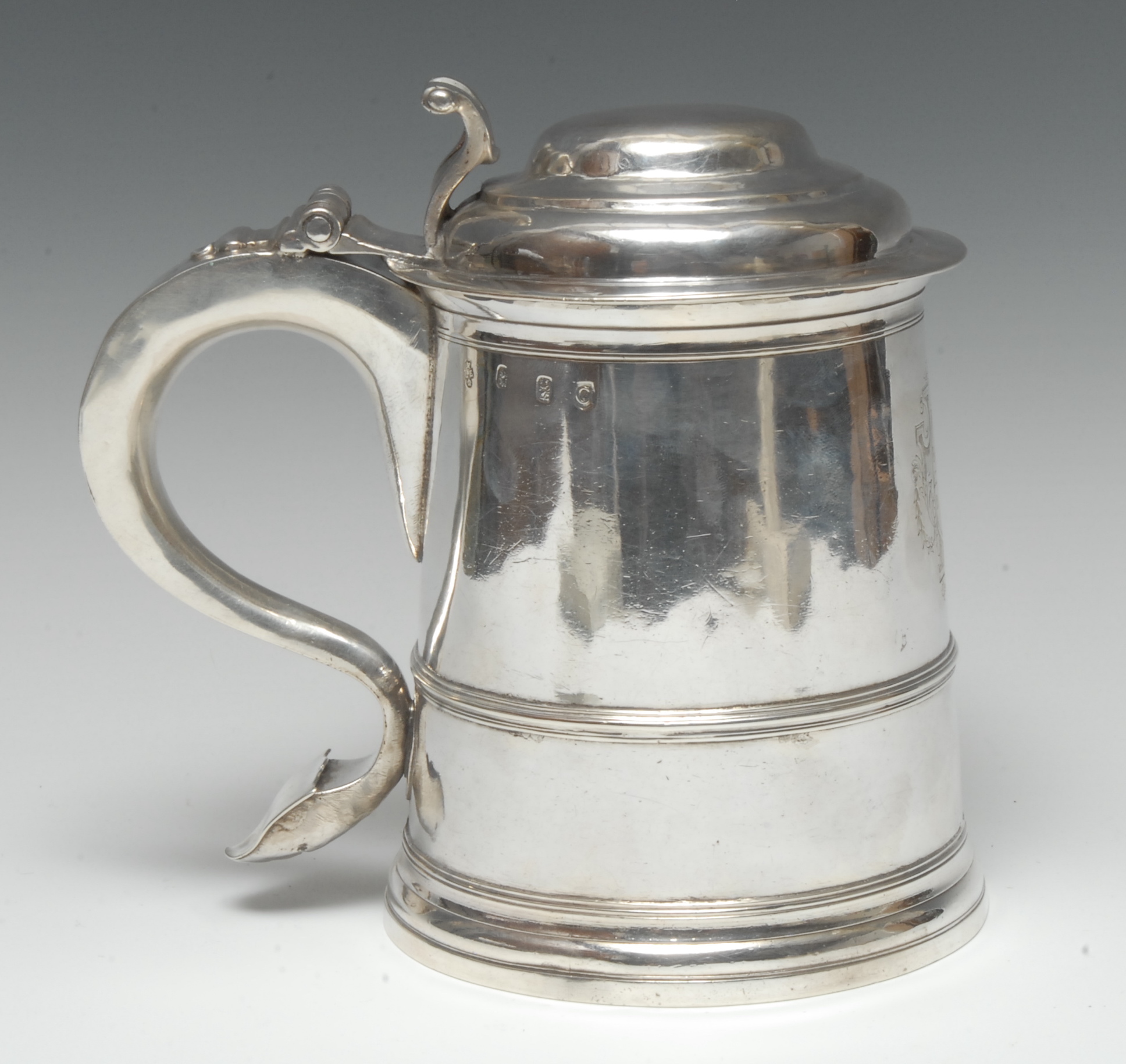 A George I silver spreading cylindrical tankard