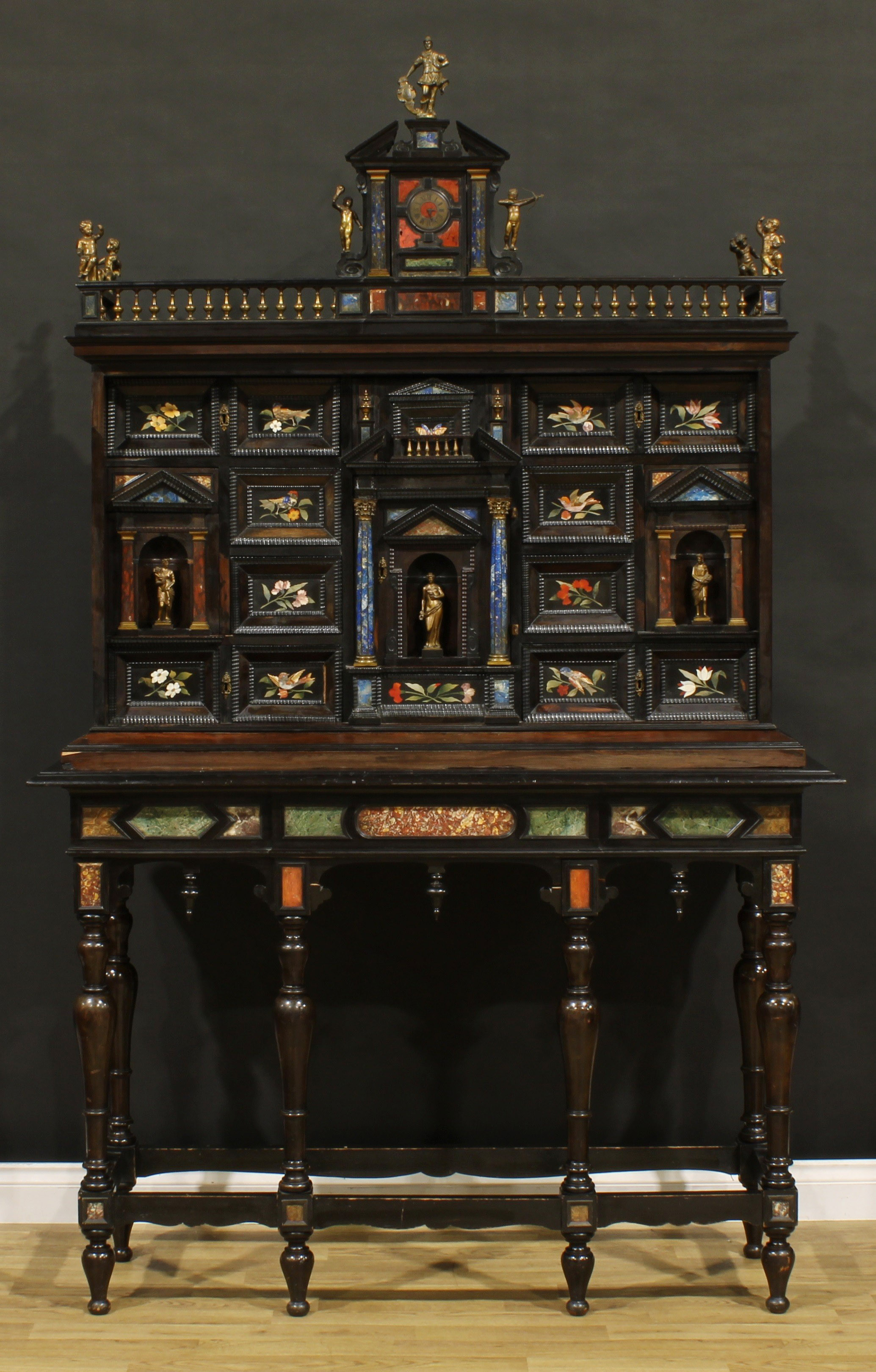 A late 19th century Italian gilt metal and pietra dura mounted rosewood and ebonised cabinet on stand