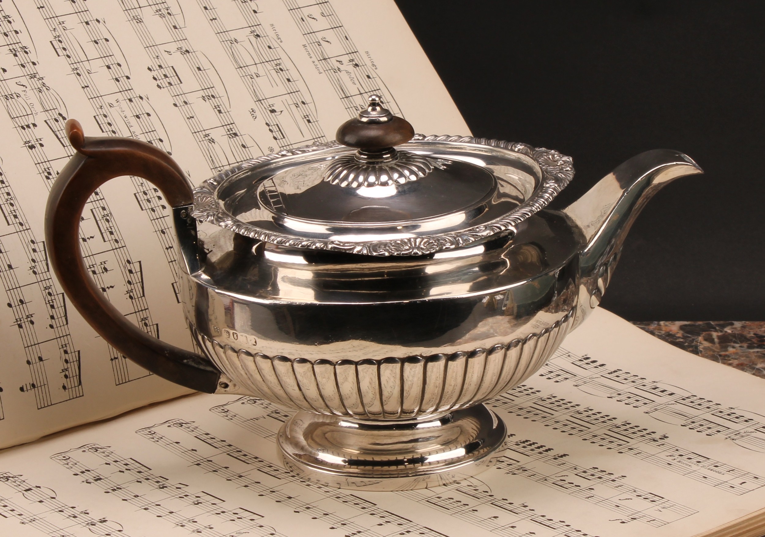 Paul Storr - a George III silver half-fluted lamp shaped teapot