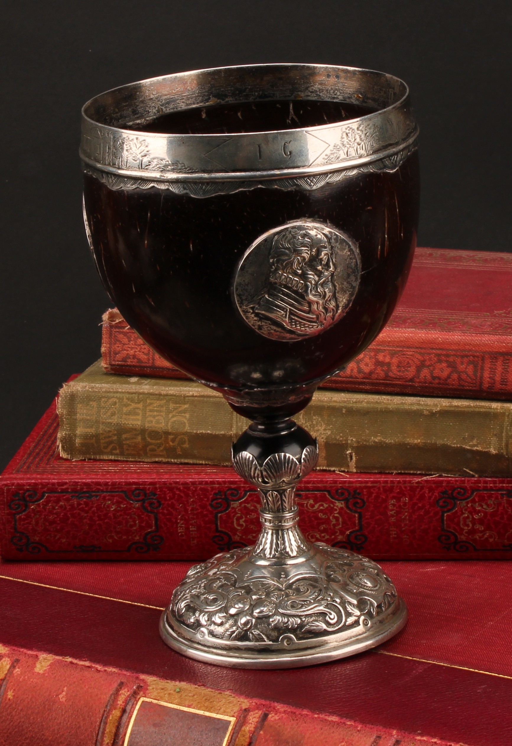 An 18th century silver mounted pedestal coconut cup