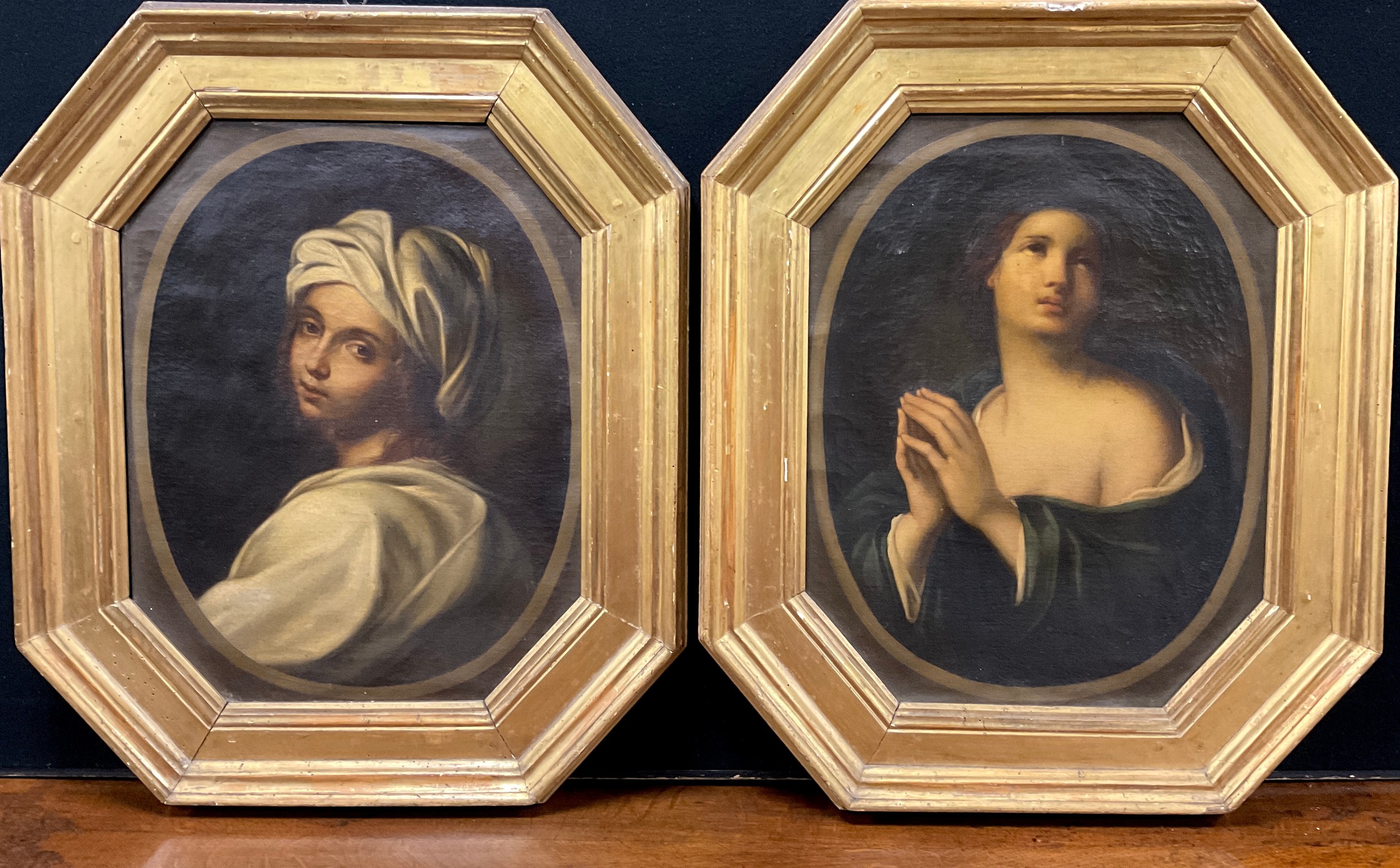 After Guido Reni (19th century) A pair, Portrait of Beatrice Cenci and Mary Magdalene  oil on canvas, 54cm x 41cm, octagonal giltwood frames