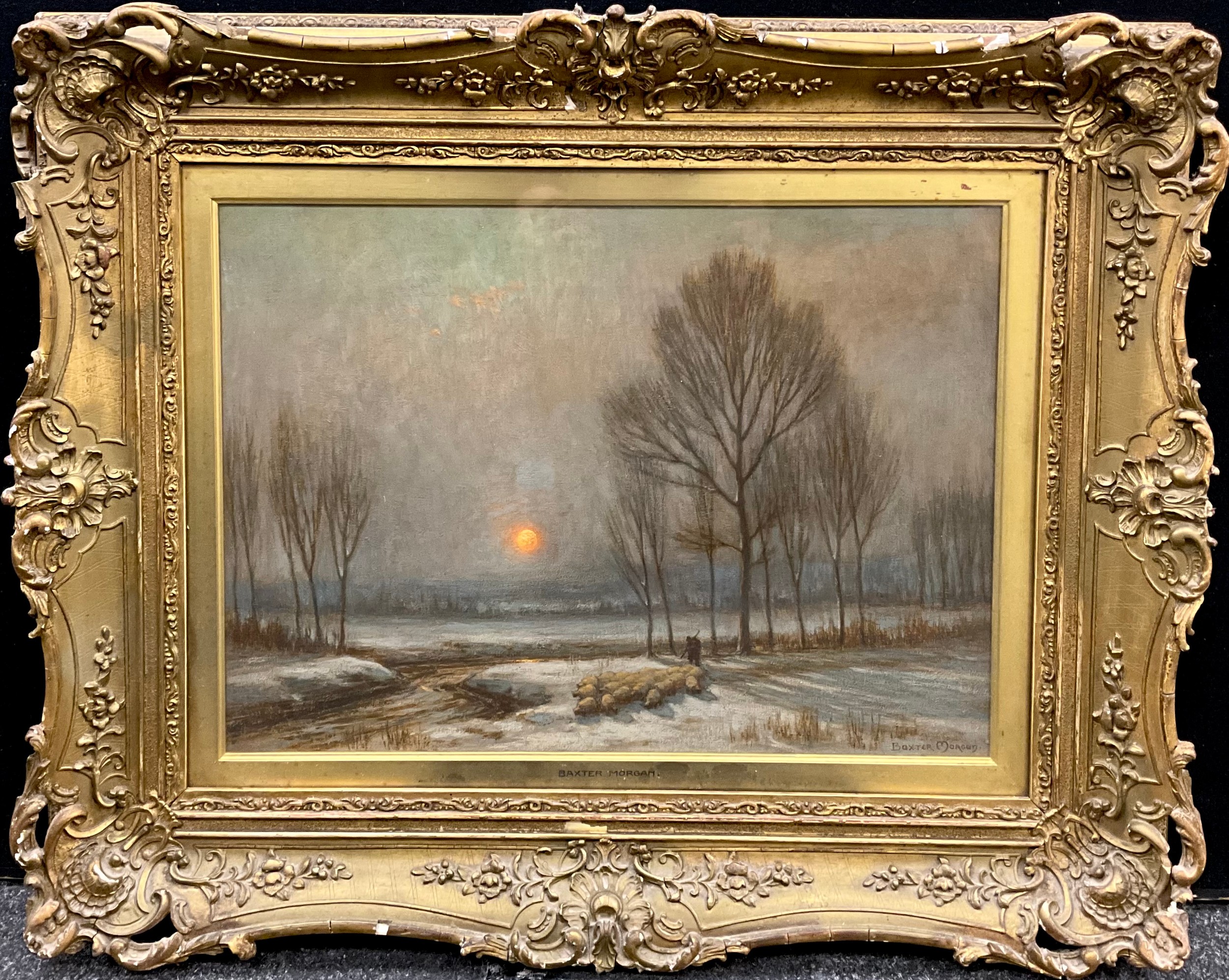 Owen Baxter Morgan (fl.1905-1932)  A Shepherd and his flock at sunset  signed, oil on canvas, 41cm x 56cm.