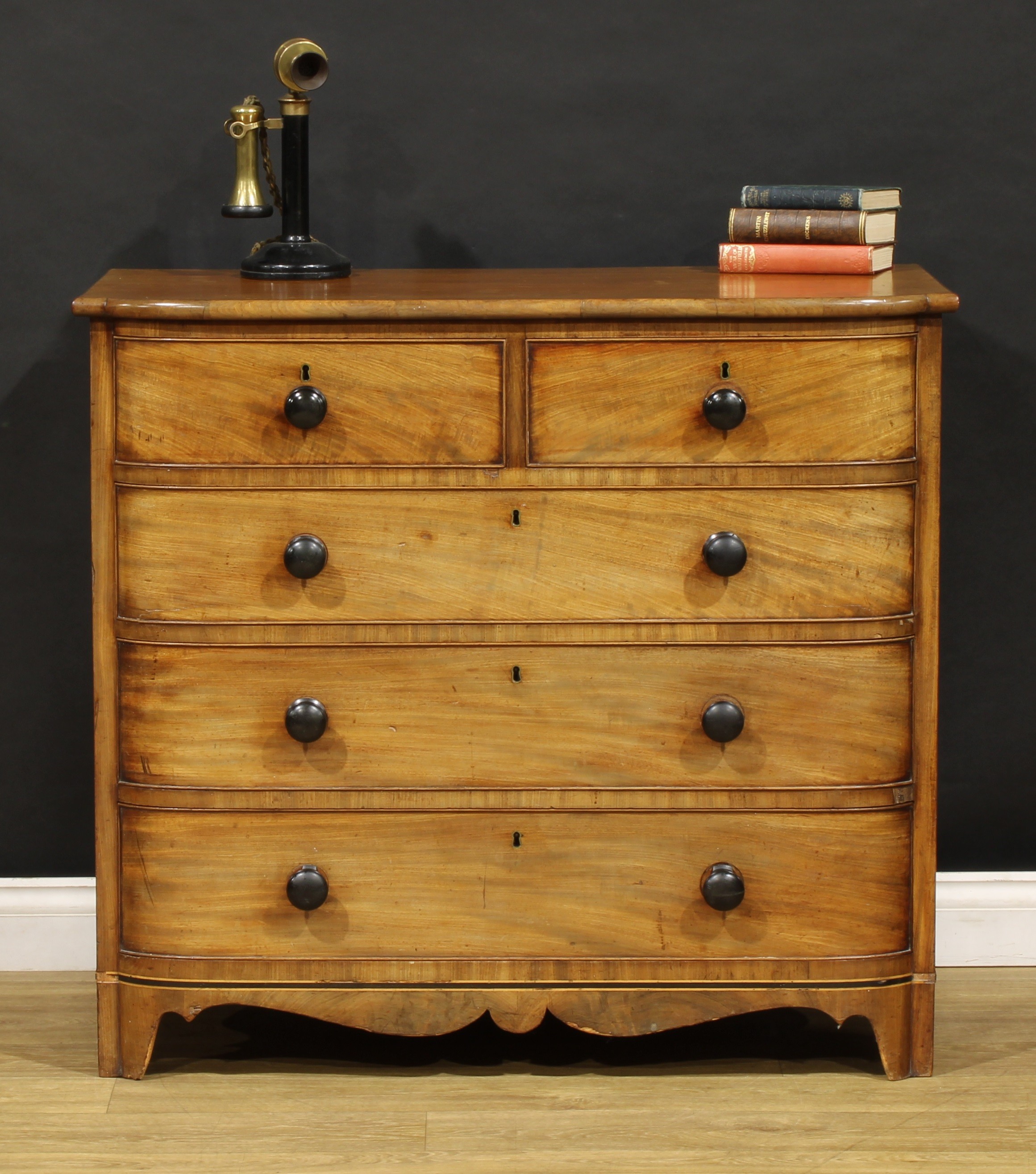 A George IV mahogany chest, of two short and three long graduated drawers, 91.5cm high, 101cm wide, 52.5cm deep, c.1825