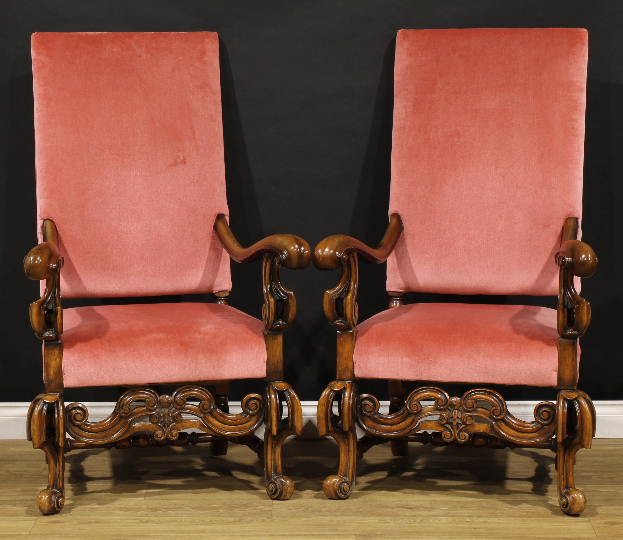 A pair of William & Mary style open armchairs, stuffed-over upholstery, 131cm high, 77cm wide