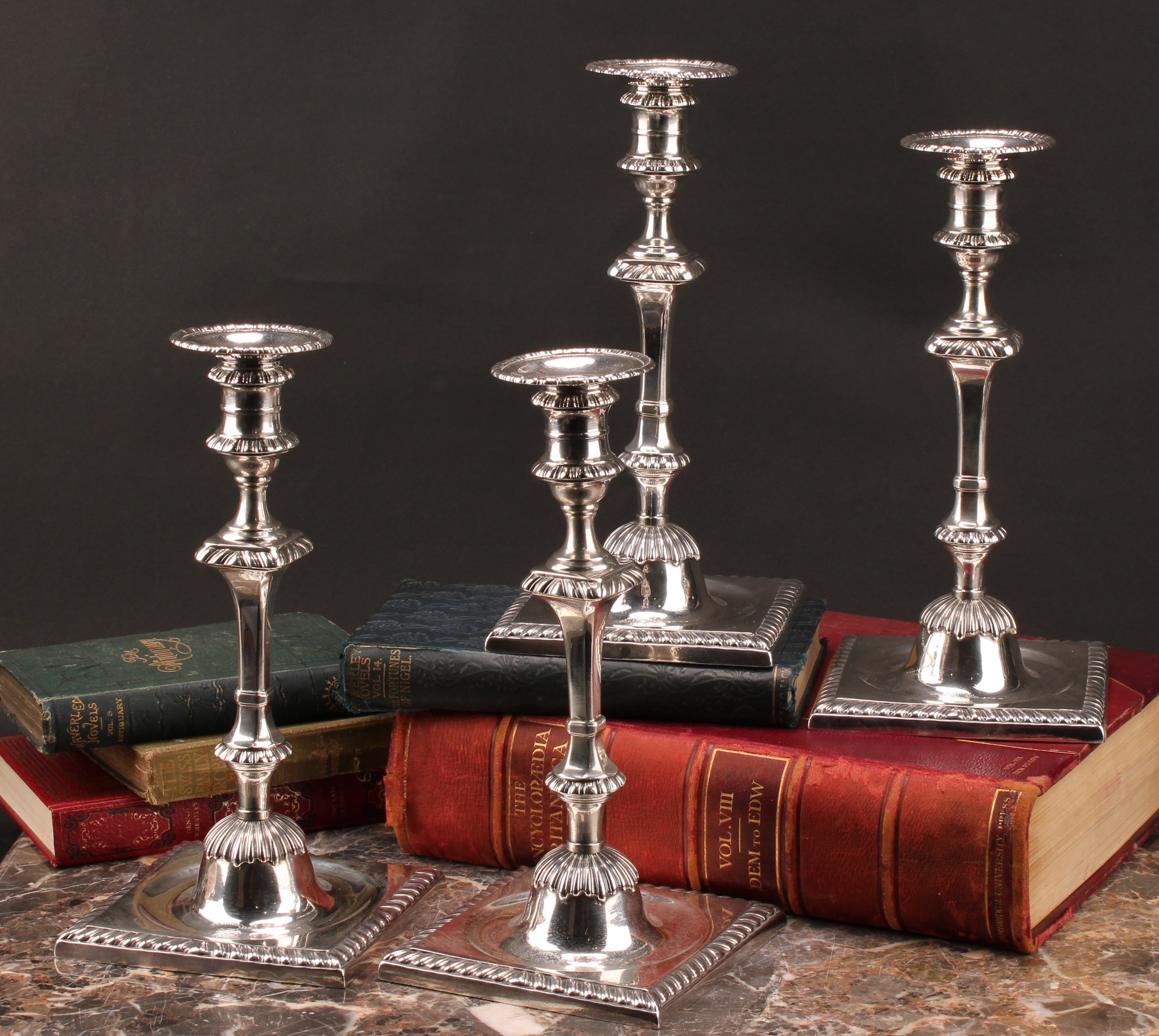 A set of four early George III Scottish silver cast table candlesticks, Lothian & Robertson, Edinburgh 1760