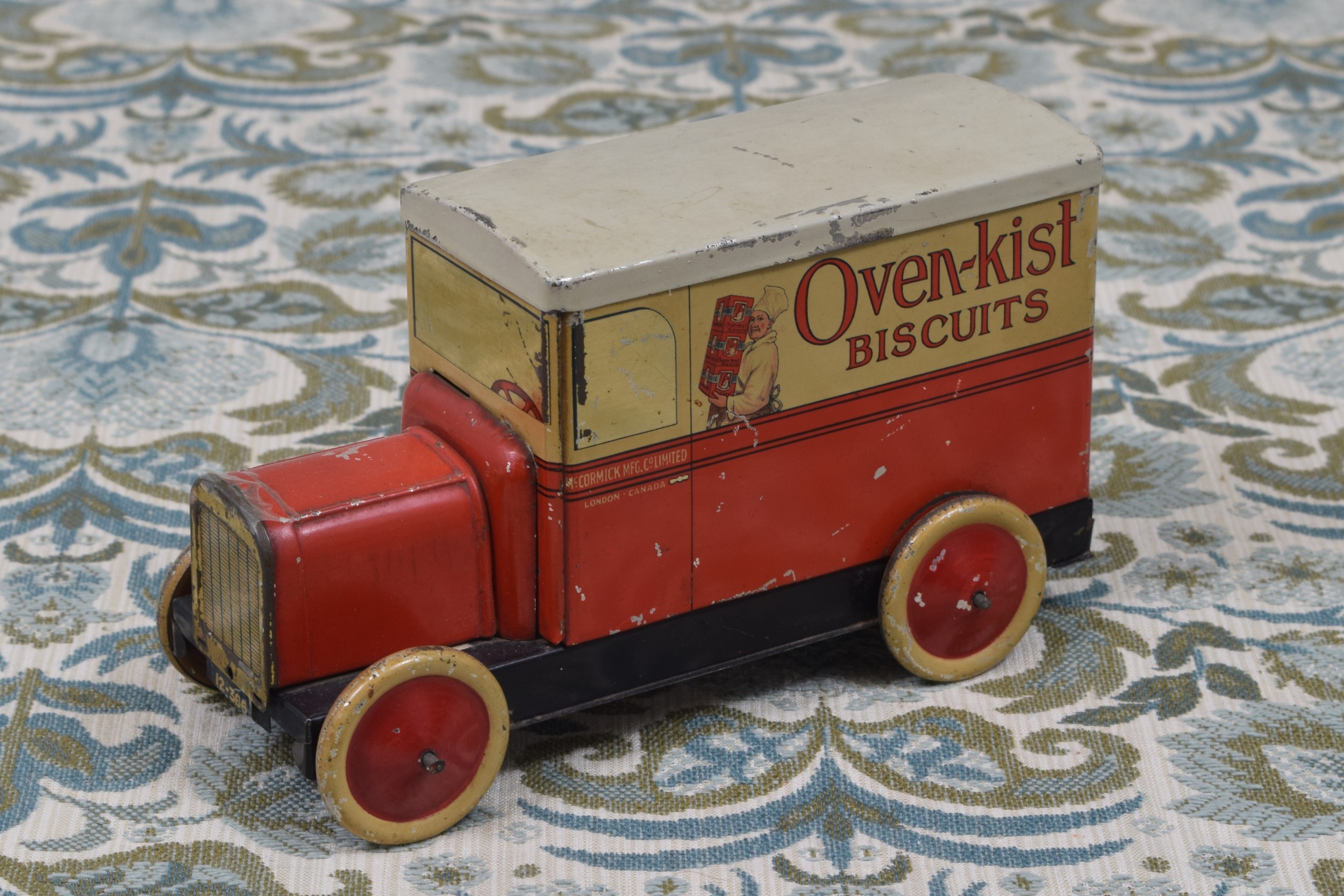 Advertising - a McCormick novelty tinplate biscuit tin in the form of a delivery van