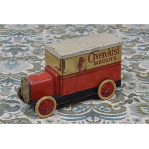 A McCormick novelty tinplate biscuit tin in the form of a delivery van