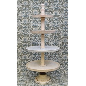 A late Victorian white ironstone butcher, baker or cheesemonger shop display stand