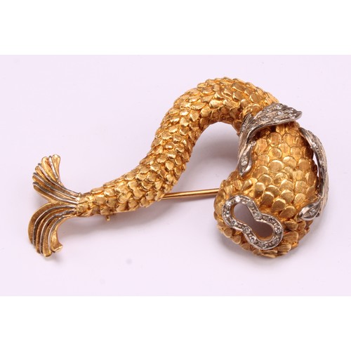 An 18ct yellow and white gold diamond stylised 'dolphin' brooch