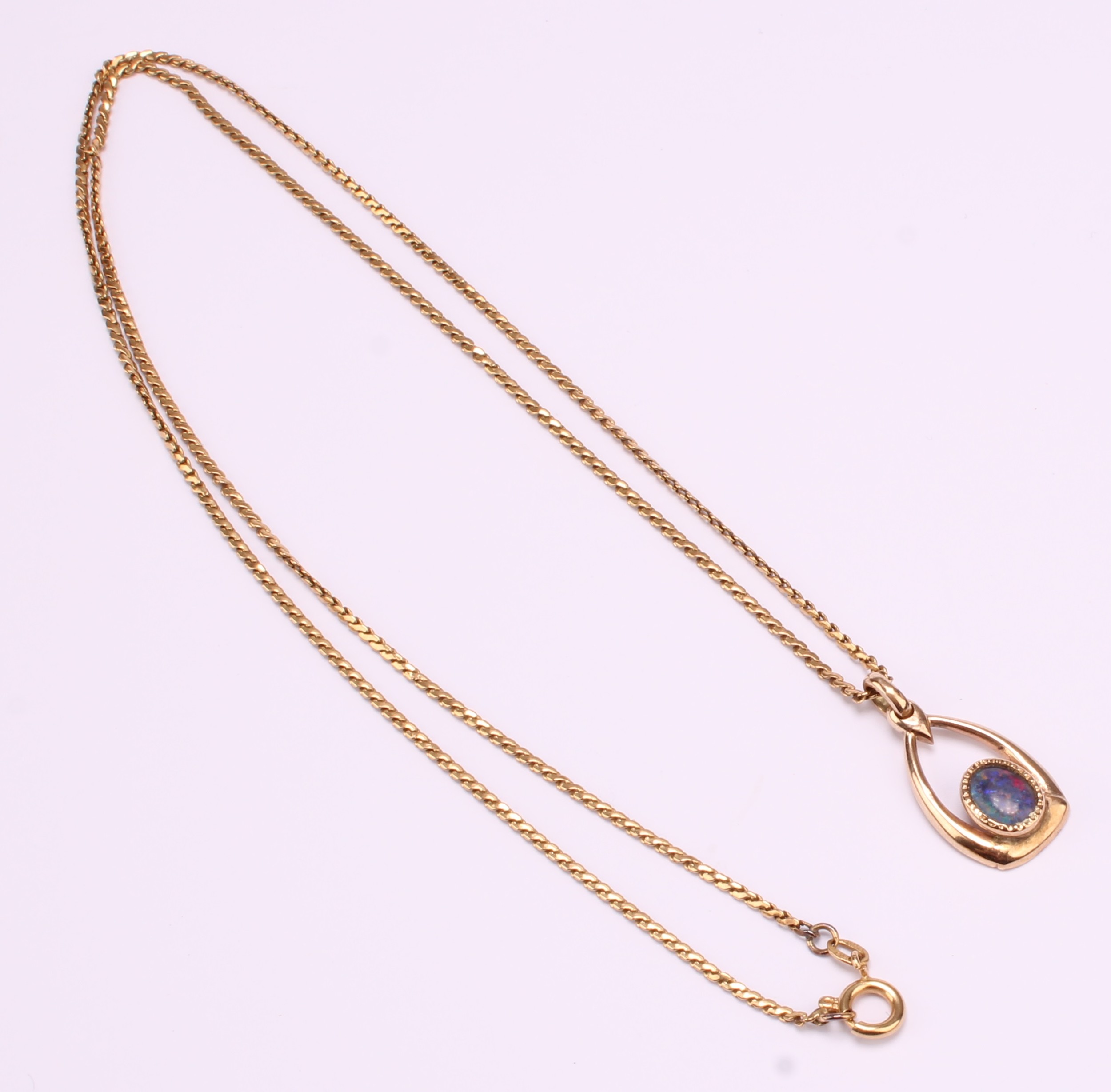 9ct gold black opal doublet pendant with 18ct gold fine chain