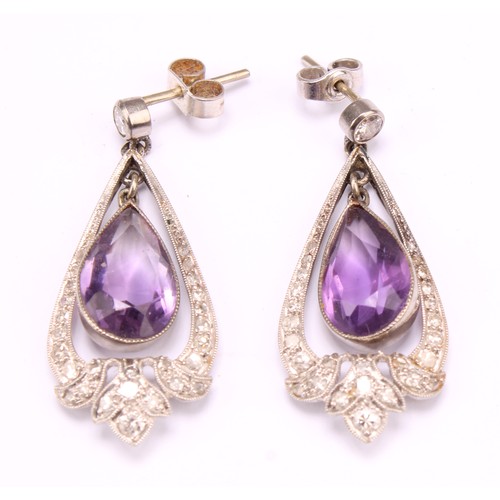 A pair of unmarked white metal art nouveau style diamond and amethyst chandelier drop earrings