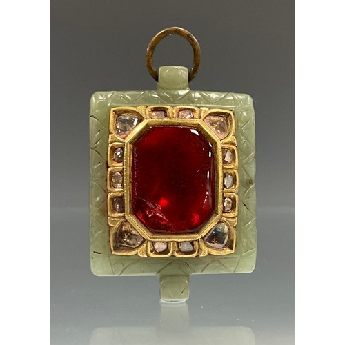 A diamond, jade and foil backed ruby red coloured tablet pendant