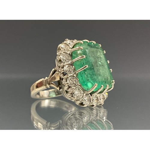 A large emerald and diamond ring