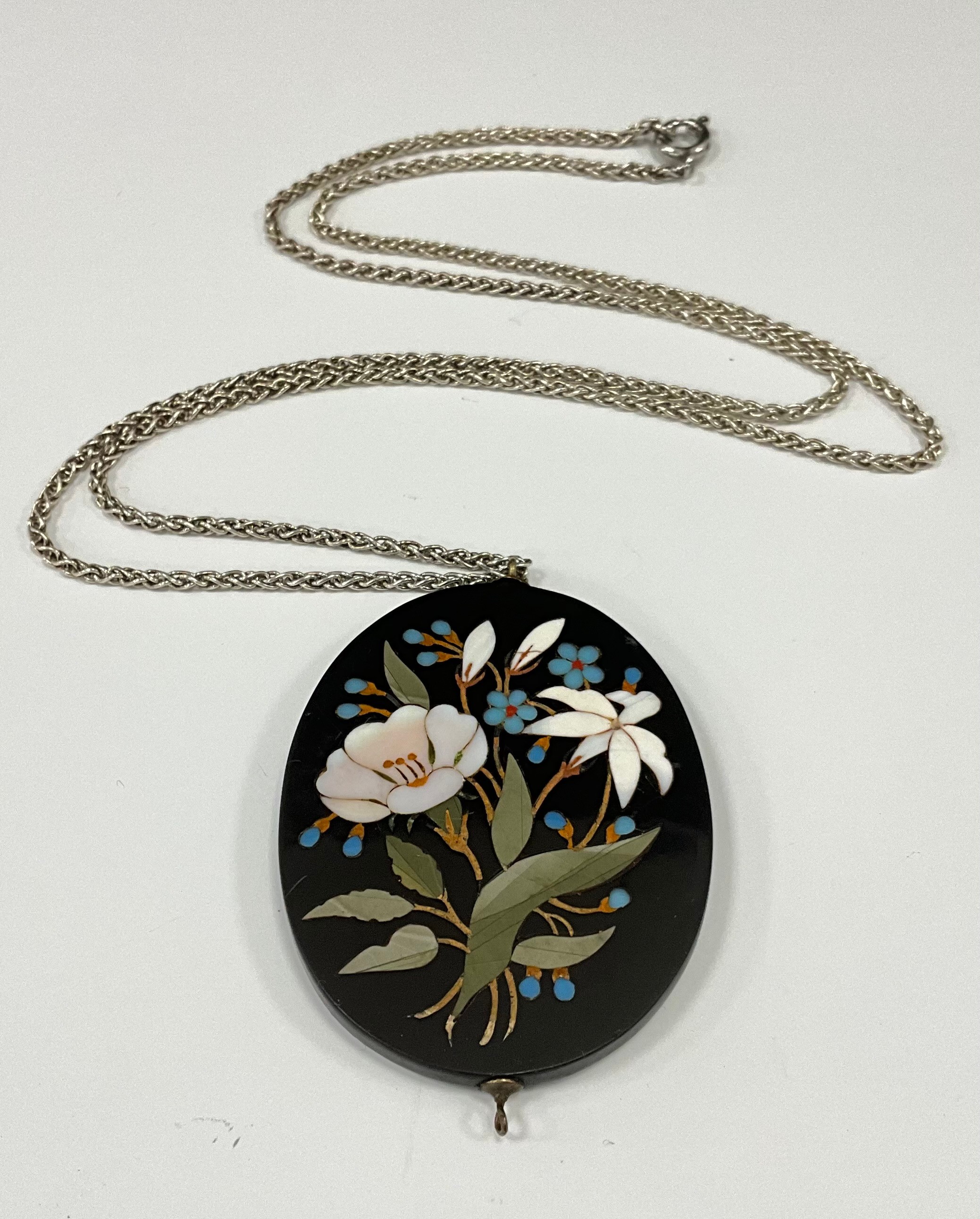 A Victorian Ashford black marble oval necklace pendant