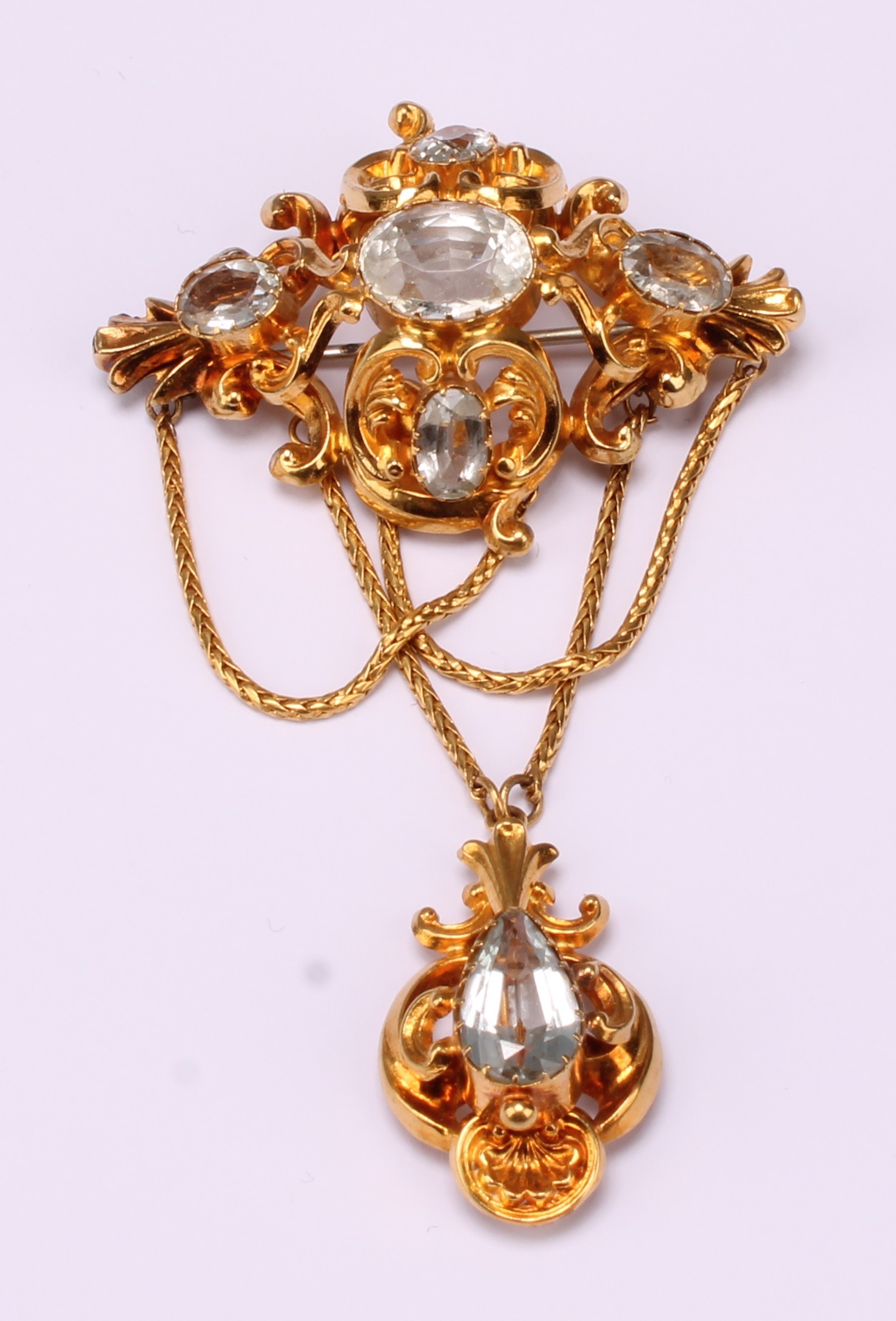 A Victorian Topaz and yellow metal pendant brooch 