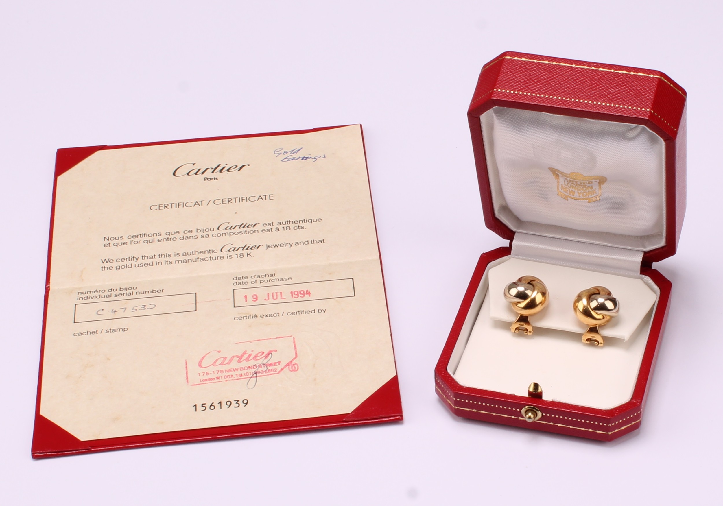 Cartier - The iconic Trinity design stud earrings, with tricolour knot design