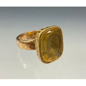 An Order of Ermine pale yellow citrine intaglio seal stamp signet ring, with latin inscription Malo mori quam foedari" , translating to english ("I would rather die than be dishonored")