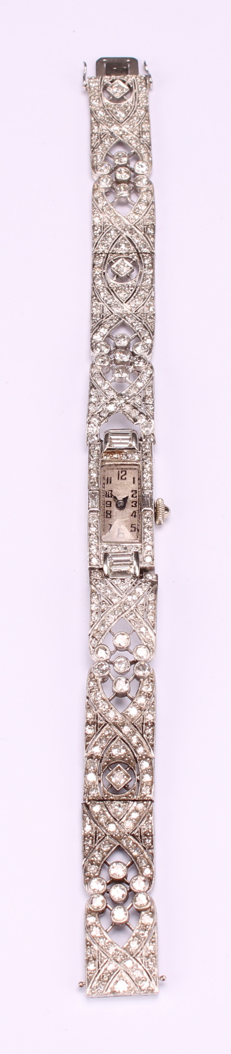 An Art Deco diamond set platinum cocktail watch