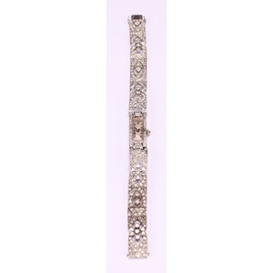 An Art Deco diamond set platinum cocktail watch
