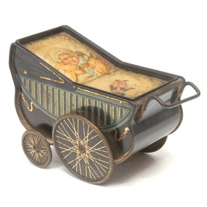 An early 20th century novelty lithographed tinplate biscuit tin, modelled as a pram, c.1910
