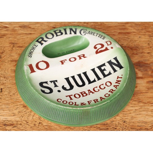 An early 20th century Ogden's circular combination ashtray and change tray