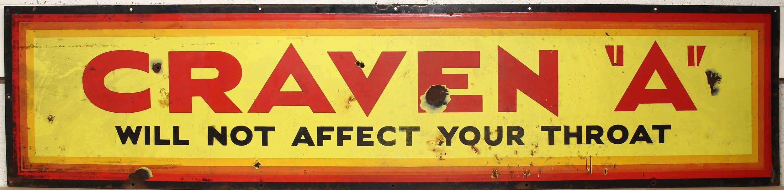 A rectangular enamel sign, 'Craven ''A'' Will Not Effect Your Throat'