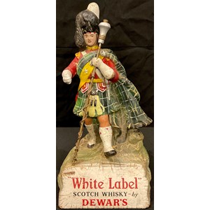 A shop/bar display figure, Dewar's White Label Scotch Whisky