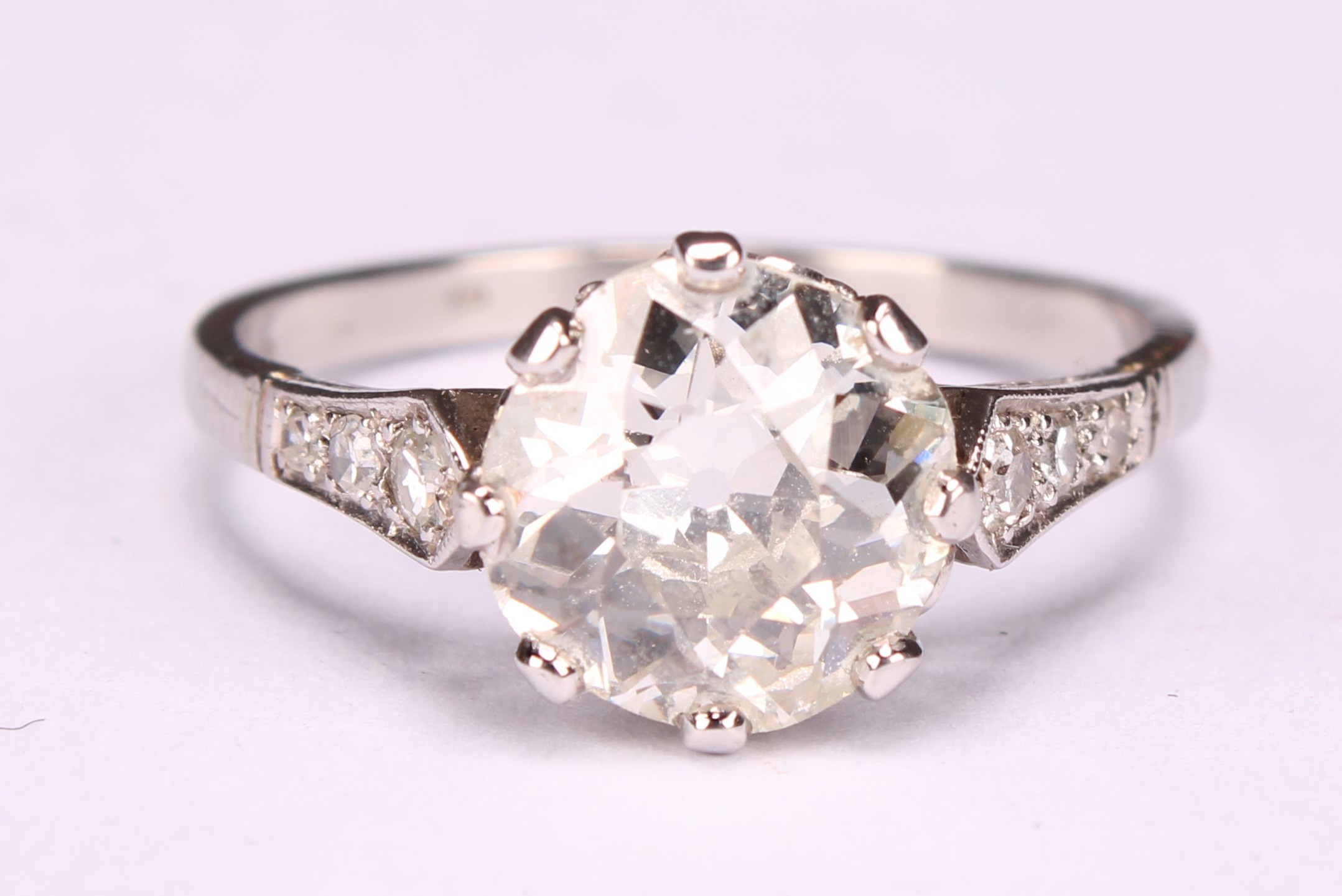 A diamond and platinum solitaire ring