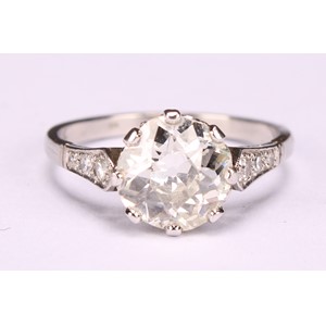 A diamond and platinum solitaire ring