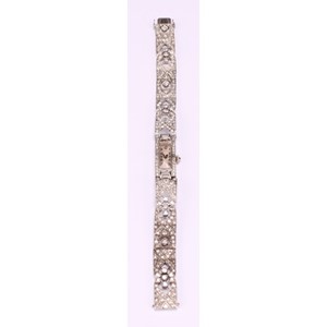 An Art Deco diamond set platinum cocktail watch