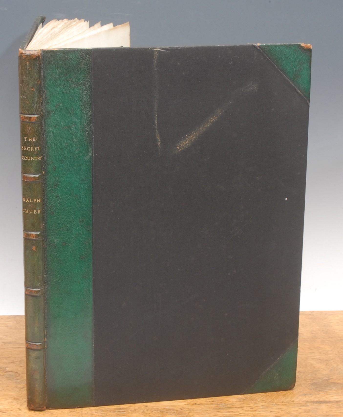 Book – Uranian interest: Chubb (Ralph Nicholas, 1892-1960), The Secret Century: or Tales of Vision, 1sr and only edition, Wolverton Hants., Fair Oak, Kingsclere, published by the author n. d. (1939) number 18 of only 37 printed, small folio (15 x 11 in/38 x 26cm), 61 leaves printed verso only, designed, illustrated and lettered by the author on Barcham Green land made paper, 60 lithographic illus., bound by G Frewin in half green Niger Morocco over black Sundour cloth boards, 5 raised bands and gilt titles to spine, bkplt. Nicholas Wilde (1)