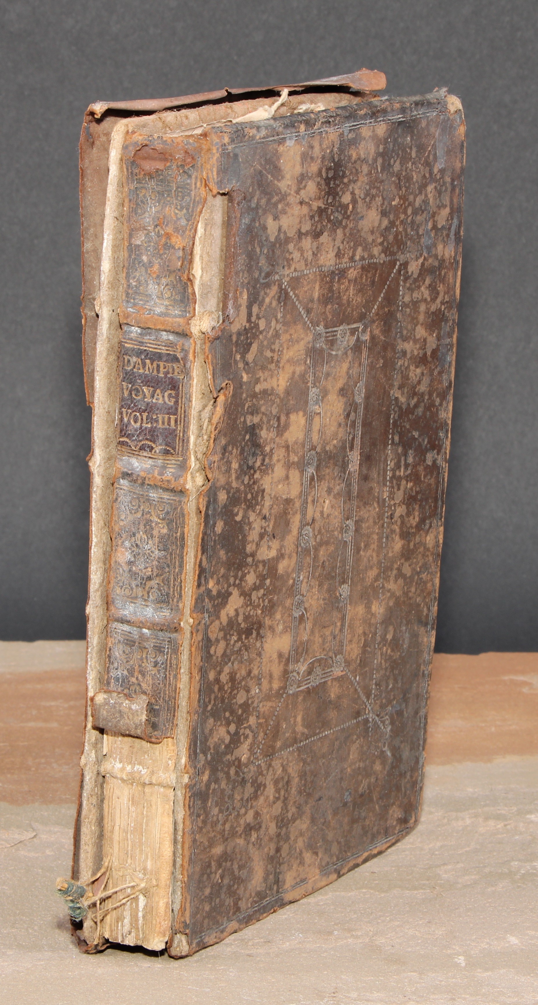 Dampier, William, A Voyage to New Holland, &c. in the year 1699, where in are described The Canary Islands, Isles of Mayo, and St Jago, The Bay of All Saints, etc, Vol III, First Edition. 162 numbered pages, followed by index and five pages of publishers' ads. Folding map at frontispiece, plus Dedication and Preface, natural history plates throughout. this being Vol. III in Captain William Dampier's adventure series stands alone, though a continuation of this work was published London, printed for James Knapton, Crown in St Pauls Church Yard, 1703, tooled boards