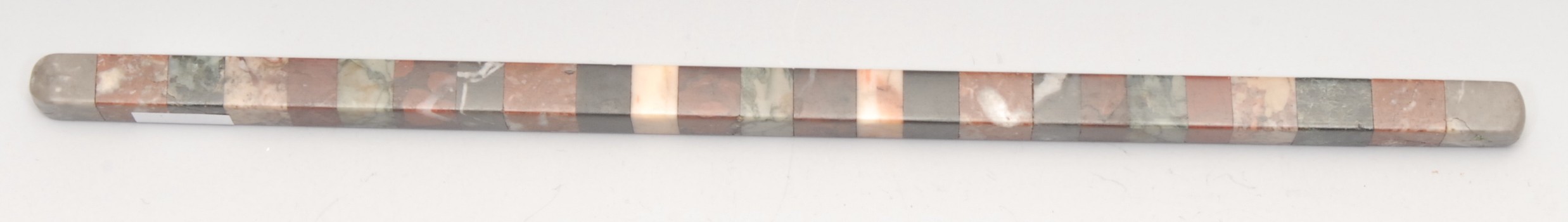 A 19th century Italian Grand Tour specimen marble rectangular rule, composed of bands of verde antico, breccia and other sample stones, 24.5cm long, c.1860