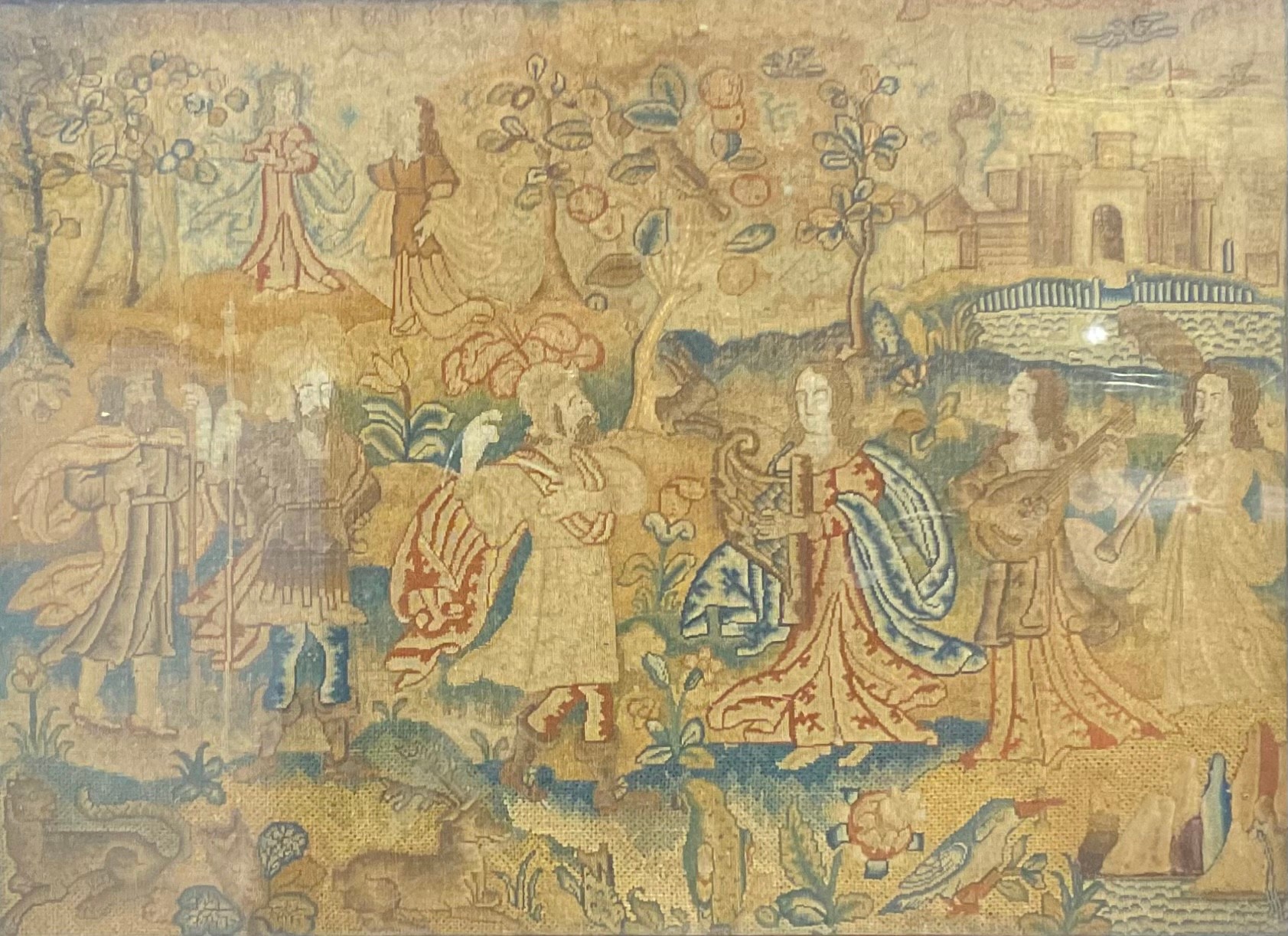 A Charles II needlework picture, worked in coloured threads and raised gilt braid with David playing the harp for Saul, 36.5cm x 49.5cm, c.1670, tortoiseshell frame, 43.5cm x 57cm